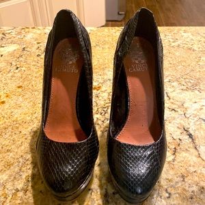 Black leather snake print heels. There is some wearing to the inside of the shoe